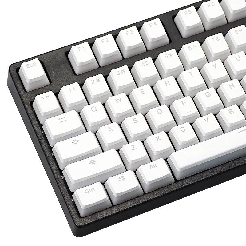 White pudding-style PBT keycap set with 141 pieces showing dye-sublimated legends on mechanical keyboard