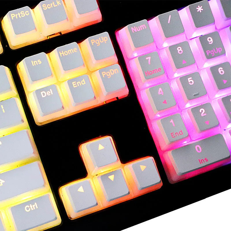 White pudding-style PBT keycap set with 141 pieces showing dye-sublimated legends on mechanical keyboard