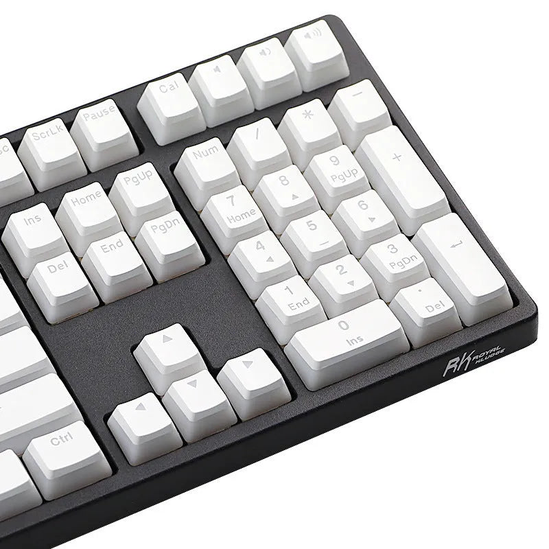 White pudding-style PBT keycap set with 141 pieces showing dye-sublimated legends on mechanical keyboard