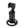 Black smart tracking gimbal stabiliser clipped onto a smartphone, showing its rotating base.