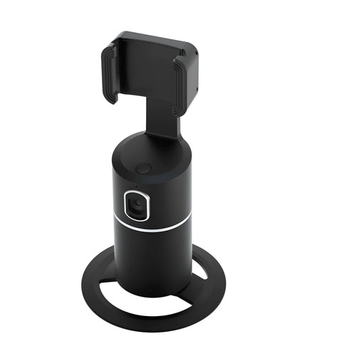 Black smart tracking gimbal stabiliser clipped onto a smartphone, showing its rotating base.