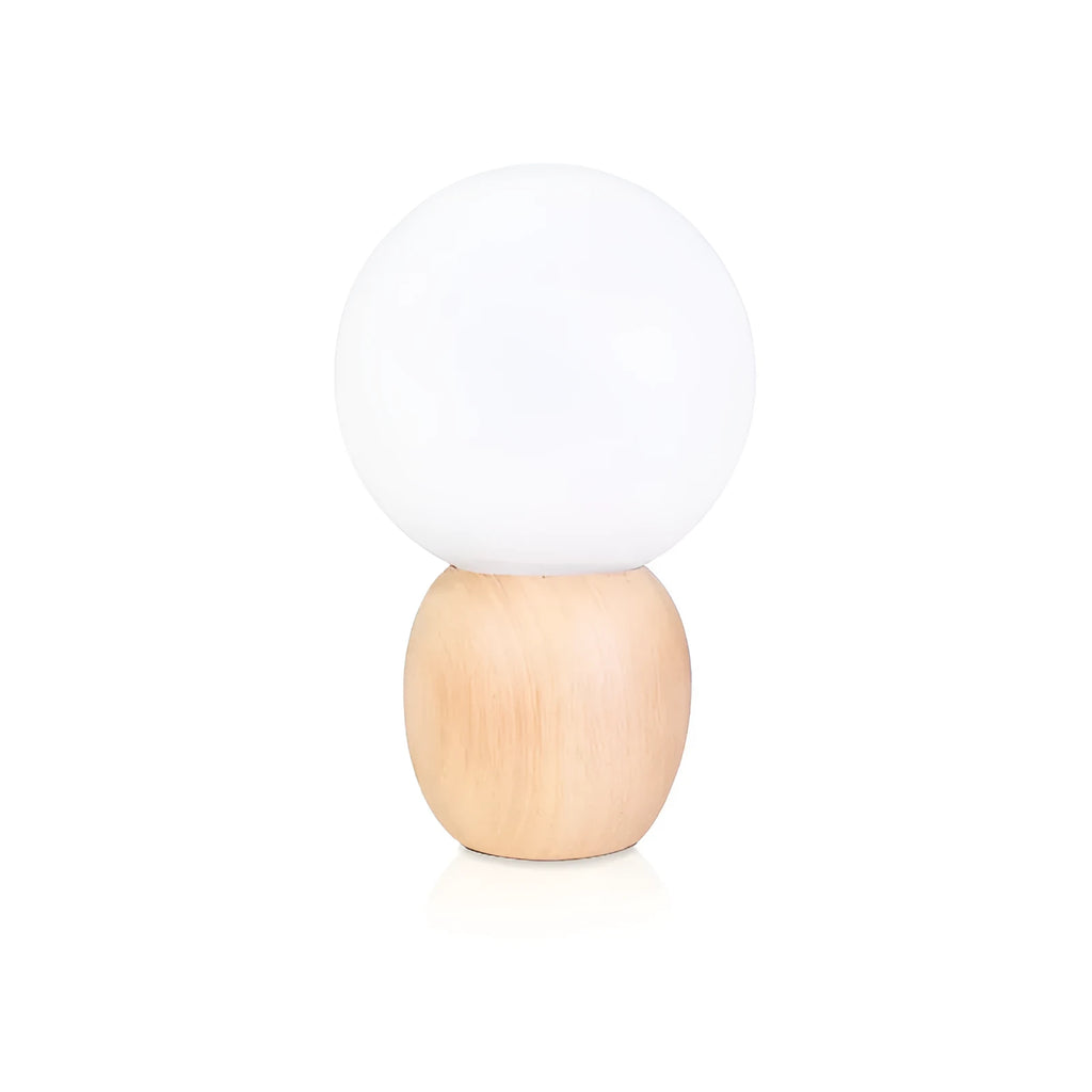 Nordic style glass ball table lamp with large glass shade and LED light source on table