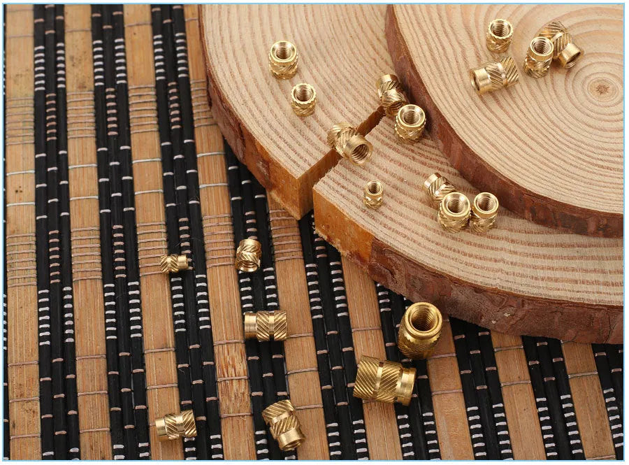 Brass hot melt copper nuts showing M2 and M3 thread options with multiple height variations