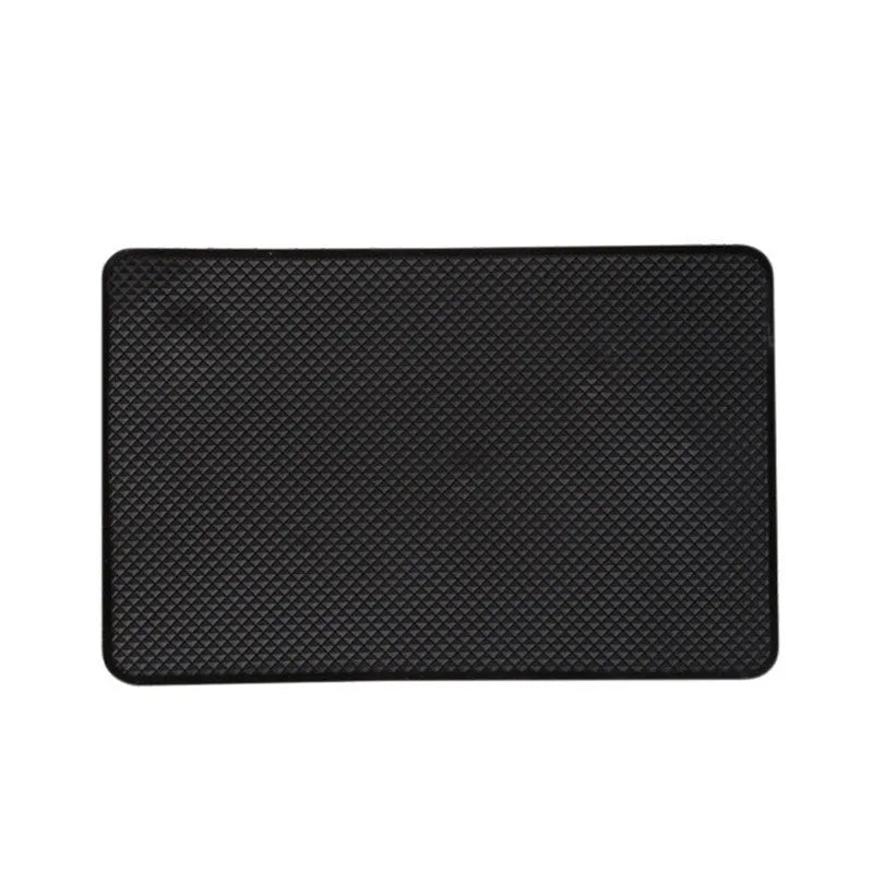 Black mesh car dashboard non-slip mat, 18x13cm, 60g, holding small items like phone, coins and glasses.