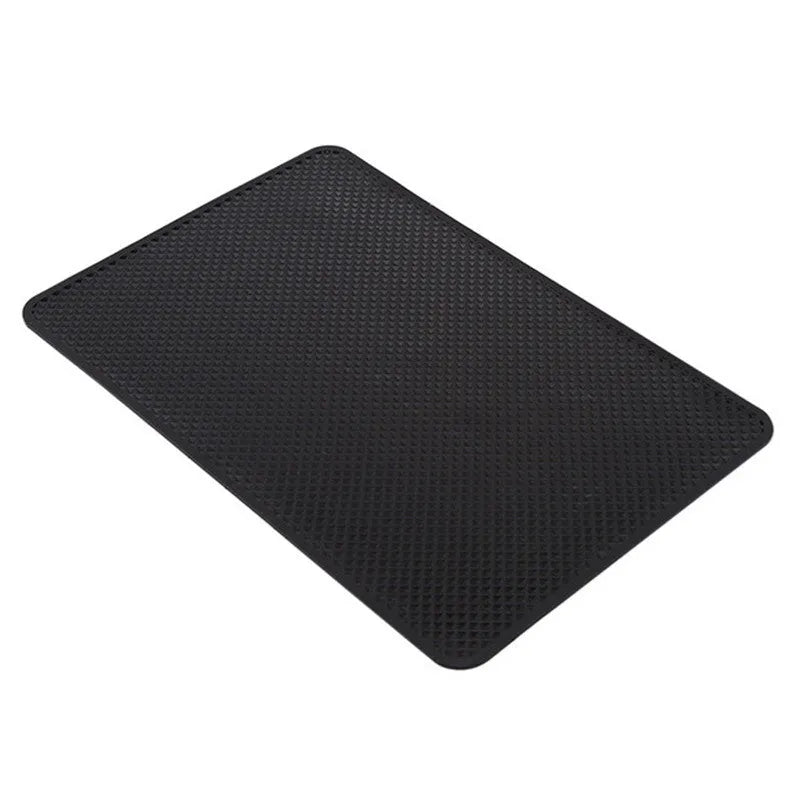 Black mesh car dashboard non-slip mat, 18x13cm, 60g, holding small items like phone, coins and glasses.