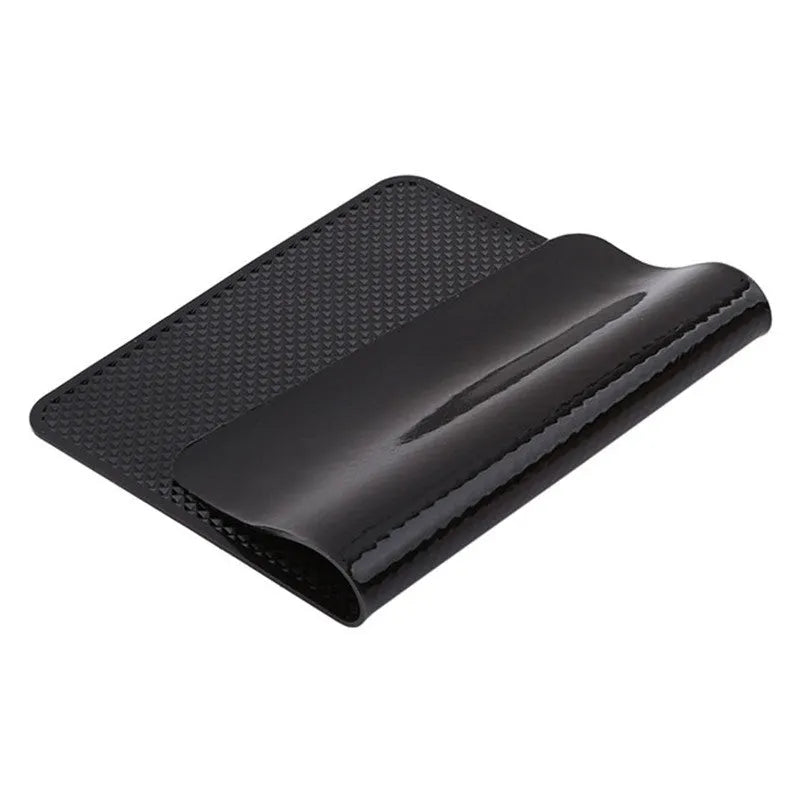 Black mesh car dashboard non-slip mat, 18x13cm, 60g, holding small items like phone, coins and glasses.