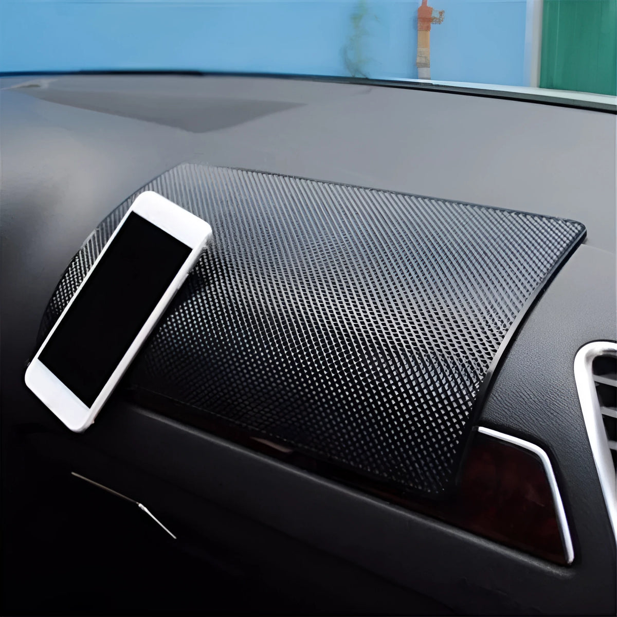 Black mesh car dashboard non-slip mat, 18x13cm, 60g, holding small items like phone, coins and glasses.