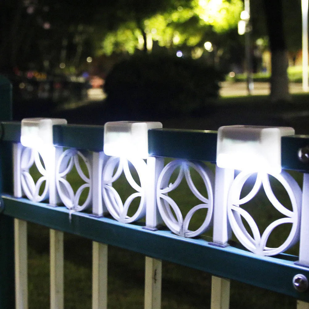 White outdoor solar railing light mounted on stair with LED illumination