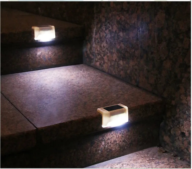White outdoor solar railing light mounted on stair with LED illumination