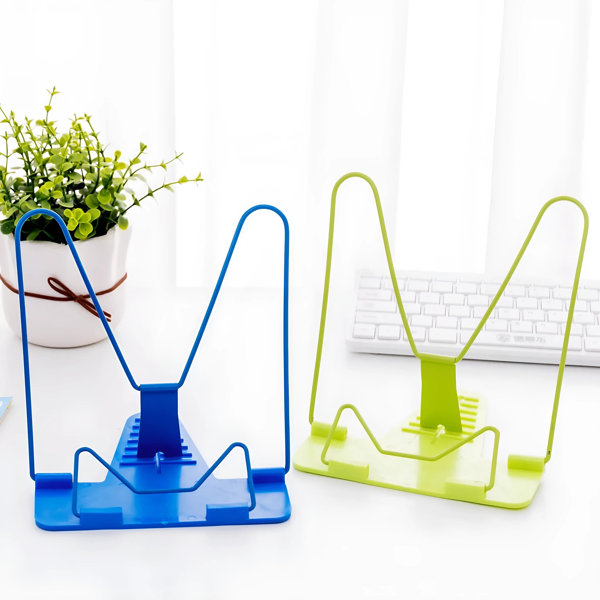 Blue adjustable reading frame holding a book upright at 16 x 17.5 cm with metal and plastic construction