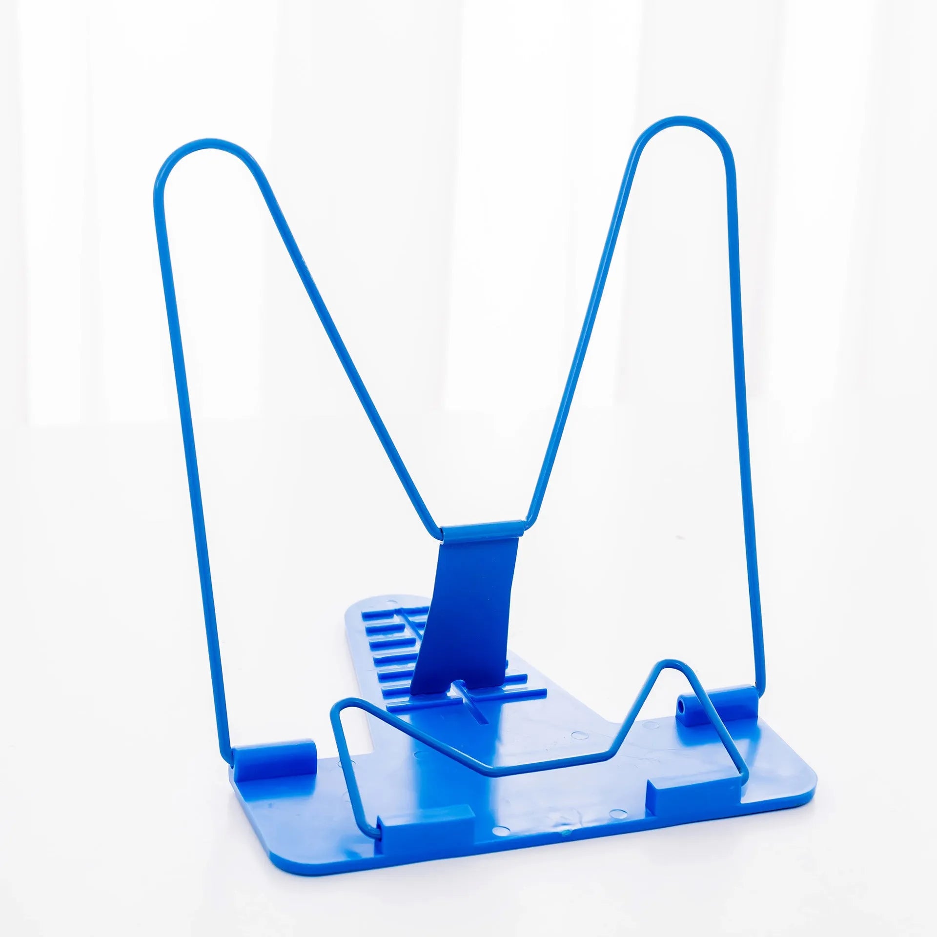 Blue adjustable reading frame holding a book upright at 16 x 17.5 cm with metal and plastic construction