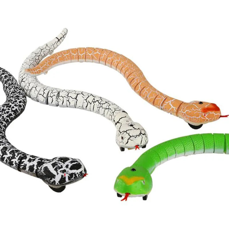 Black and grey cobra snake toy robot with remote control, USB charging cable, and batteries