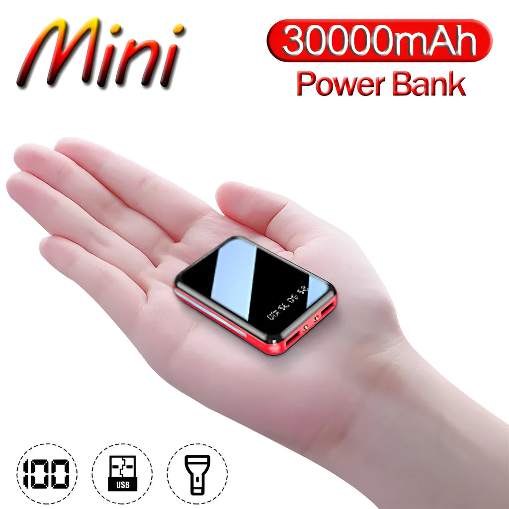 30000mAh mini portable power bank in black with dual USB output ports on a wooden surface