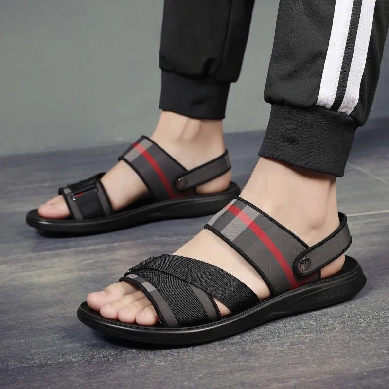 A pair of youth sports sandals with a Lycra upper and polyurethane sole, shown with an international sizing chart.