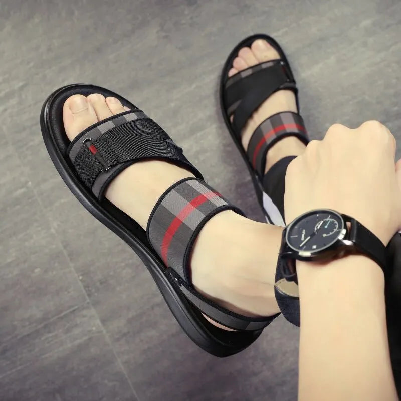 A pair of casual sporty sandals with a blue Lycra upper and light Polyurethane sole on a white background.