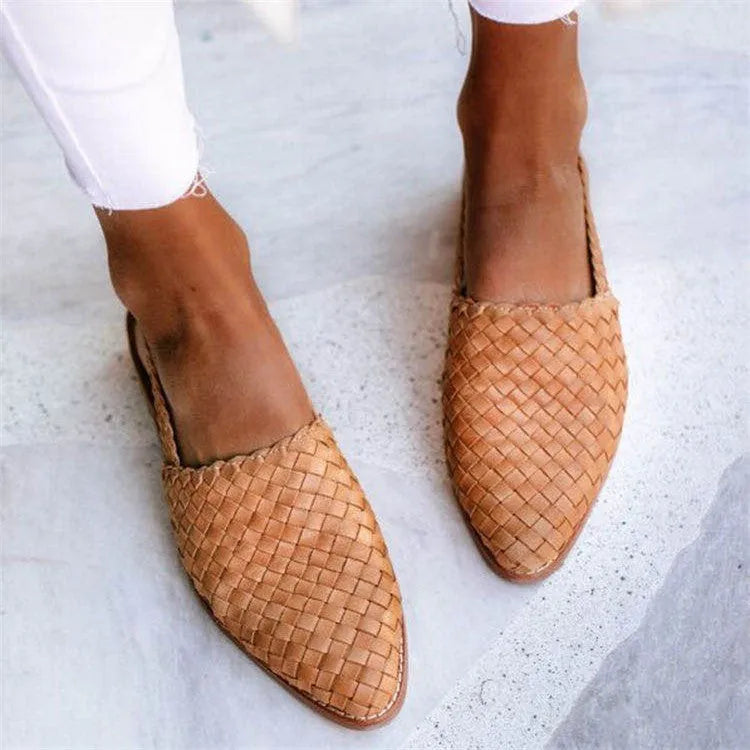 Women's flat sandals with a buckle and pointed toe in multiple colour options.