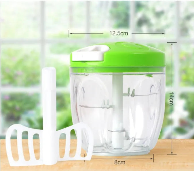 Green manual kitchen chopper and meat grinder with three blades, showing 500ml capacity.