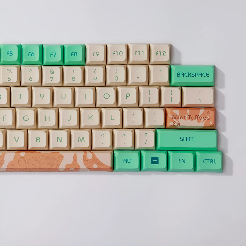 Mint toffee coloured DSA profile PBT keycap set arranged for an XDA104 mechanical keyboard.