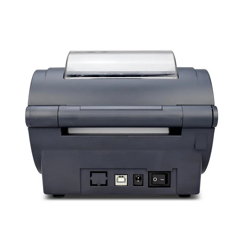 ZJ-9210 direct thermal label printer printing a 4x6 shipping label on a desk with USB cable