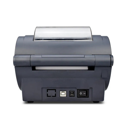 ZJ-9210 direct thermal label printer printing a 4x6 shipping label on a desk with USB cable
