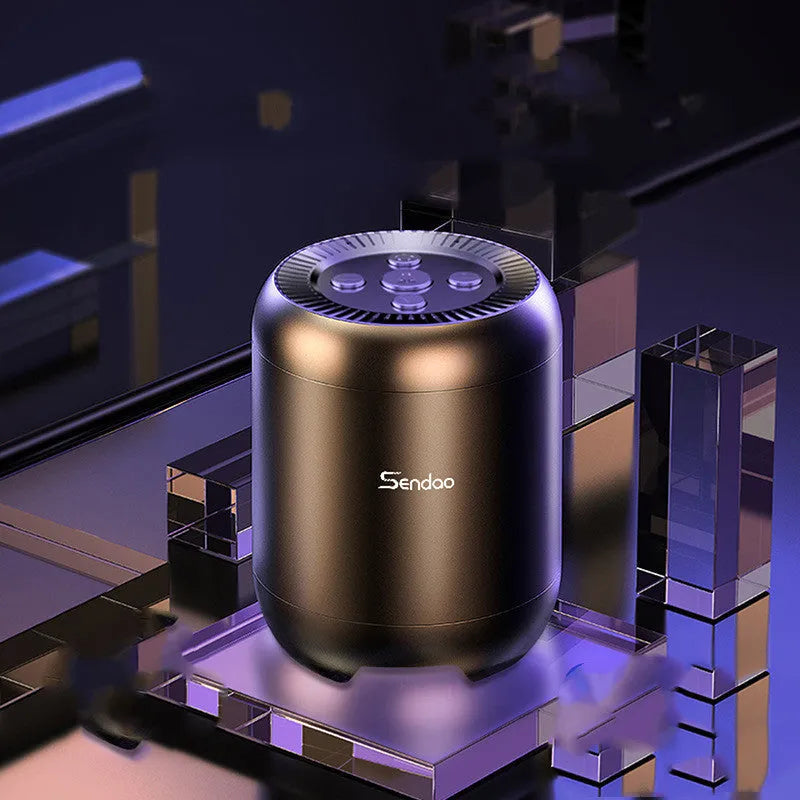 Small black or white cube-shaped Bluetooth speaker with SD card slot and USB port for charging.
