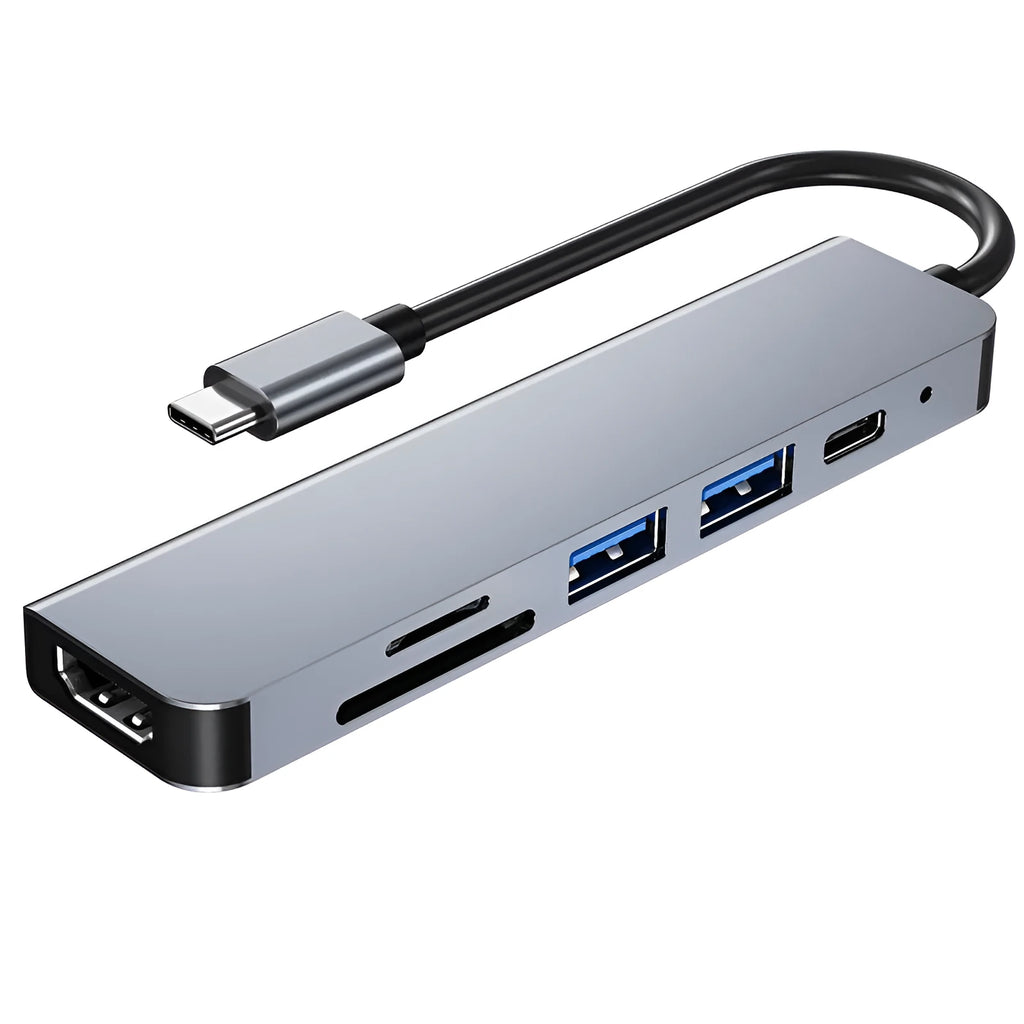 Silver 6 in 1 USB C hub adapter with USB ports, SD/TF slots, HDMI, and PD charging port