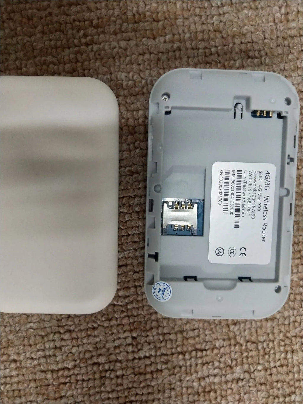 Portable 4G car wireless router with single SIM slot, measuring 104mm by 64mm by 15mm