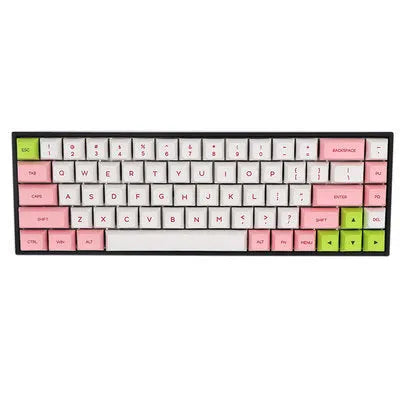 Set of 68 PBT keycaps for a mechanical keyboard in various colours including blue, grey, pink, and yellow.