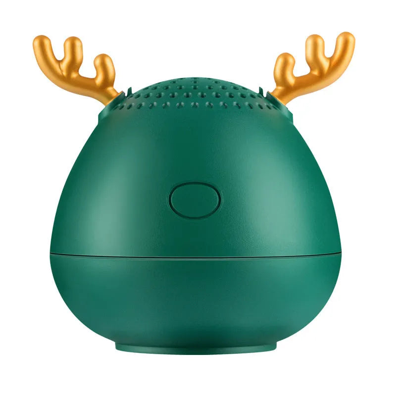 Small portable Bluetooth speaker in green colour showing compact design with USB port