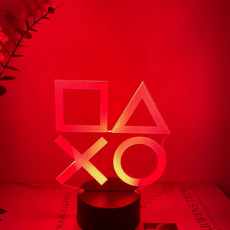 Gamepad-shaped LED desk lamp with acrylic shade on ABS base, showing touch controls and USB cable
