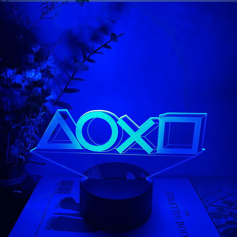 Gamepad-shaped LED desk lamp with acrylic shade on ABS base, showing touch controls and USB cable