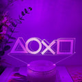 Gamepad-shaped LED desk lamp with acrylic shade on ABS base, showing touch controls and USB cable