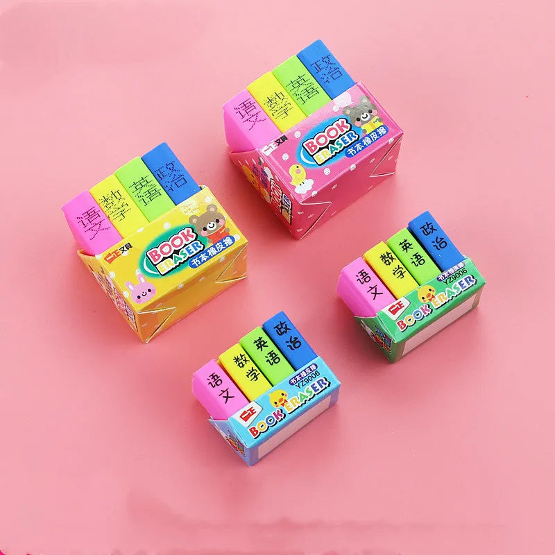 Set of four colourful cartoon book-shaped erasers for student prizes and gifts.