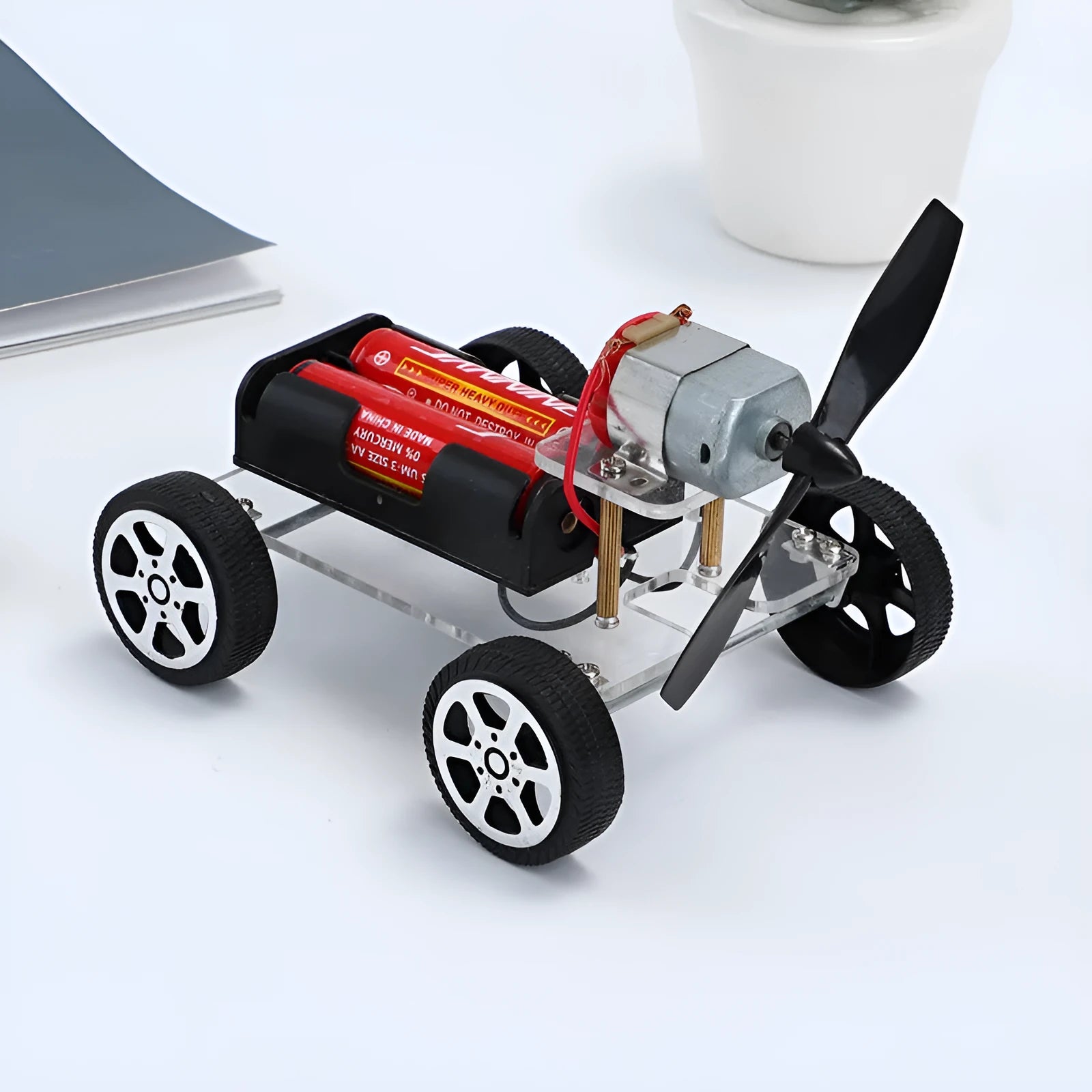 Wind car DIY electronic kit science toy with acrylic, metal, and plastic components for educational physics experiments