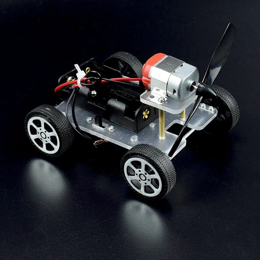 Wind car DIY electronic kit science toy with acrylic, metal, and plastic components for educational physics experiments