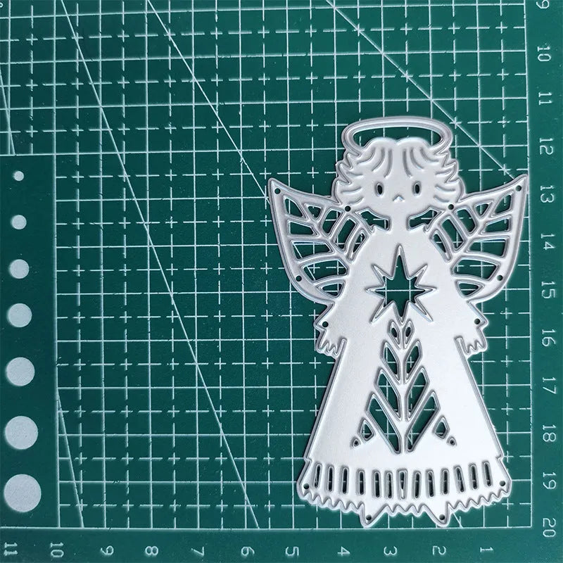 White carbon steel knife mould with an angel figure design for card embossing, 8cm by 6cm.