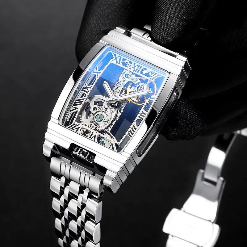 Daystar square stainless steel mechanical watch with leather strap on wrist, showing white dial