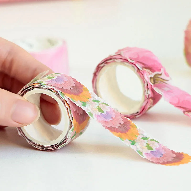 Clover and paper craft tape roll showing blue, cherry blossom, mixed colour and violet options