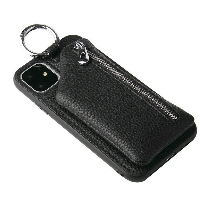 Pink PU leather phone case with a crossbody lanyard, showing the back with a zipped coin purse compartment.