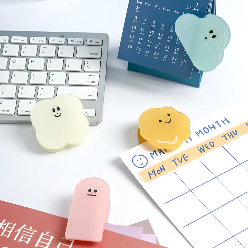 Acrylic decorative collage clips with cartoon designs in beige, blue, orange, and pink colours