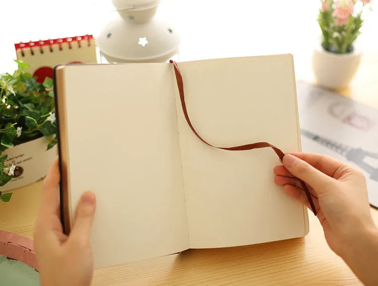 Jingu 25k thick notebook with imitation leather cover, shown in photo colour.