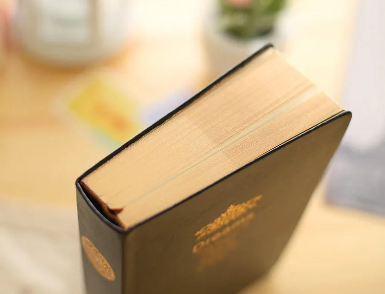 Jingu 25k thick notebook with imitation leather cover, shown in photo colour.