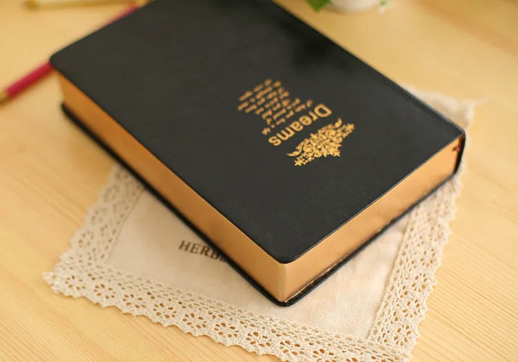 Jingu 25k thick notebook with imitation leather cover, shown in photo colour.