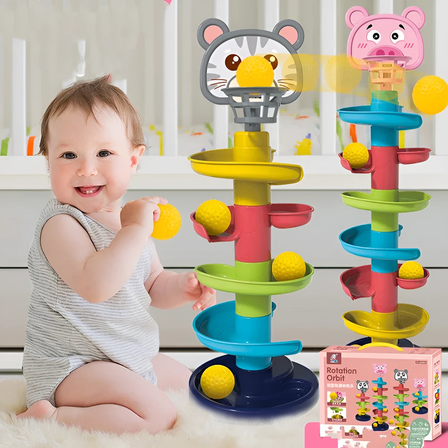 Rolling ball pile tower puzzle toy with colourful plastic spin track and rattles in a 31.5x7x24cm box