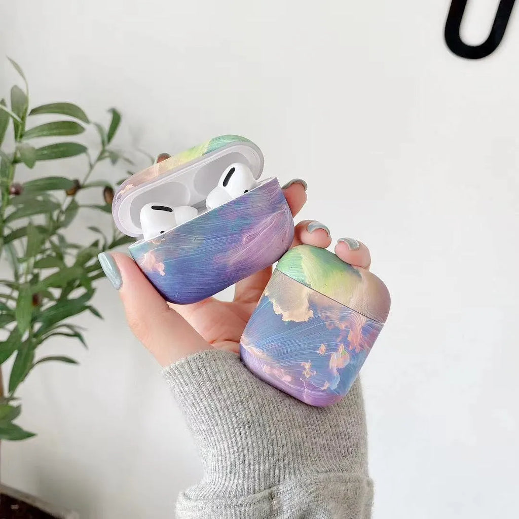 Pink and blue watercolour plastic protective sleeve for Apple AirPods 1, 2, and Pro charging cases.