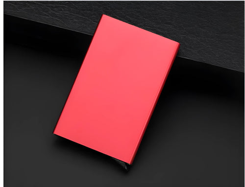 Geometric aluminium business card holder in gold finish displaying business cards