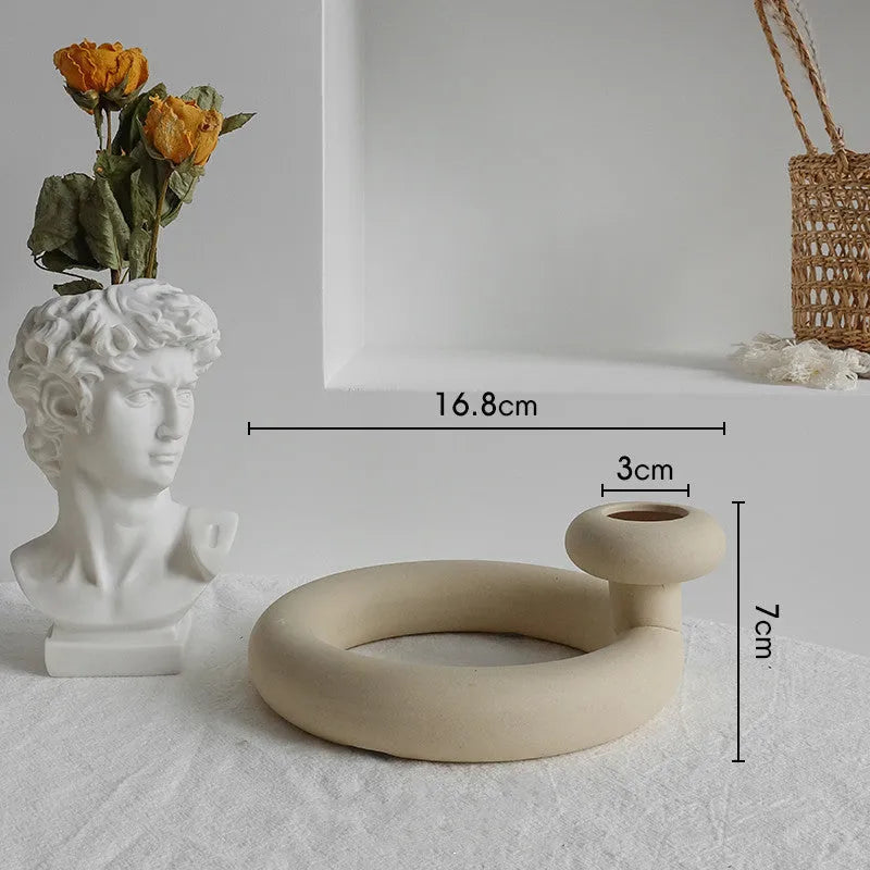 Unglazed matte ceramic vase for dry flower arrangements in Nordic style