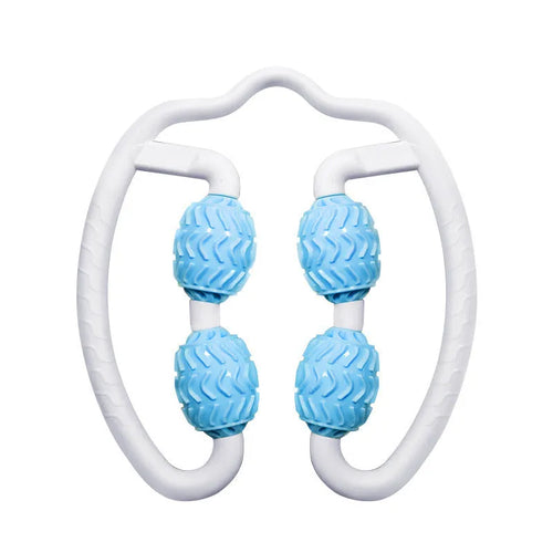 Purple annular silicone leg massage roller on a neutral background.