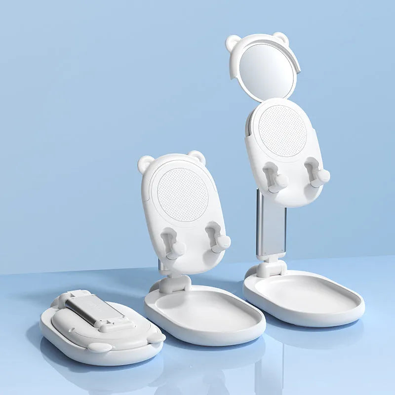 Blue foldable adjustable desk stand holding a tablet, featuring a mirrored front surface.