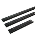 Black aluminium alloy cutting ruler with 12.5mm high protection board and non-slip pad on a cutting mat